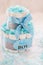 Present cake with diapers for newborn baby boy