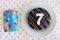 Present and chocolate birthday cake for a seventh birthday or an