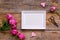 Present design with peony bouquet and white frame top view mock up