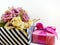 Present gift box and flowers artificial on white background