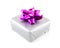 Present wrapped in silver paper and pink ribbon