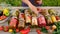 Preservation of vegetables in jars woman. Selective focus.