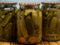 Preservations conservation Salted pickled cucumbers in a jars on an wooden table