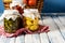 Preserved and Fermented Food Assortment of Homemade Jars with Variety of Pickled and Marinated Vegetables on Wooden Background