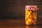 Preserved fruit in jar, compote of peaches