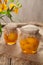 Preserved peaches in glass jars on vintage cloth