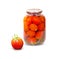 Preserved, pickled red tomatoes in glass jar isolated on white