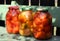 Preserved tomatoes in the glass cans