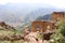 Preserved wall with the window in ruined house of abandoned ancient village Gamsutl in the Dagestan, Russia