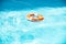 Preserver lifebuoy. Orange lifebuoy in sea on water. Life ring floating of water.