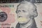 President Alexander Hamilton with mouth closed on the banknote of ten dollars USA