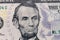 President Lincoln on the five dollar bill macro photo. United States of America currency detail.