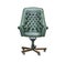 President office chair from green leather. Isolated