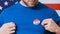 Presidential election button on a man