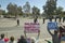 Presidential Motorcade with President George W. Bush past anti-Bush political rally with signs that read Impeach Bush in Tucson