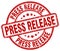 Press release red grunge round vintage stamp