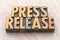 Press release word abstract in wood type