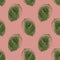 Pressed green leaves pattern on beige background