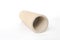 Pressed paper cylindrical tube, on white background