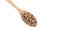 Pressed rye bran in wooden spoon on white background. Crunchy snack for breakfast. Healthy food products