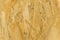 Pressed wood background texture, brown wood particle board, chipboard