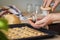 Pressing dough through a mincer to prepare Christmas cookies