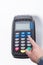 Pressing menu button on a credit card machine