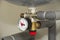 Pressure gauge on domestic boiler expansion vessel inside house