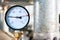 Pressure gauge showing pressure on the water supply pipe