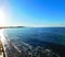Prestwick Shore, South Ayrshire, Scotland, looking south into the sun