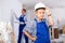 Preteen boy posing on indoor construction site