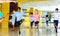 Preteen dancers practicing dance routine with female choreograph