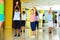 Preteen dancers practicing dance routine with female choreograph