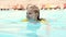 Preteen girl in pool