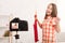 Preteen girl recording fashion video blog about new shirt