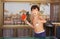 Preteen handsome boy play table tennis in the beach resort hotel