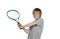Preteen playing tennis holding racket