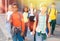 Preteen schoolchildren with rucksacks going to college