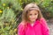 Pretty 4 year old Asian-Caucasian girl in pink coat
