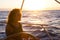 Pretty adult woman on the yacht in luxury relax lifestyle enjoying the tour travel and blue ocean - female people look at the