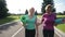 Pretty adult women going to training in the park