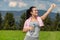 Pretty atlethic woman taking selfie in nature