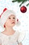 Pretty baby in santa claus christmas red hat