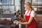 A pretty barista preparing coffee