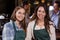 Pretty baristas smiling at the camera