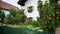 Pretty Bavarian Home with Green Picket Fence and lovely flower garden.  Oberammergau, Germany