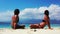 Pretty beauty models relaxing having fun on the beach on sunny blue and white sand background 4K