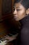 Pretty black woman at piano