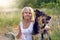 Pretty blond woman with her two dogs