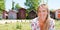 Pretty blonde woman near fisherman wooden hut in biganos Arcachon bay France